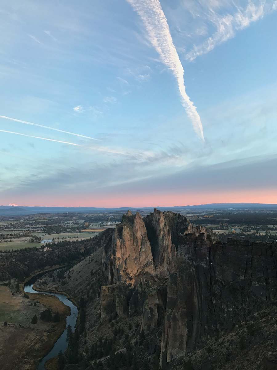 smith rock state park aerial photography of rock formation surrounded with body of water terrebonne